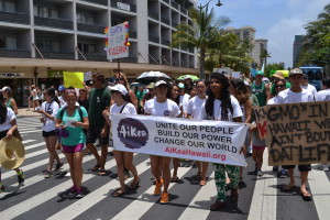 AiKea organizers march at an anti-GMO rally in Waikiki